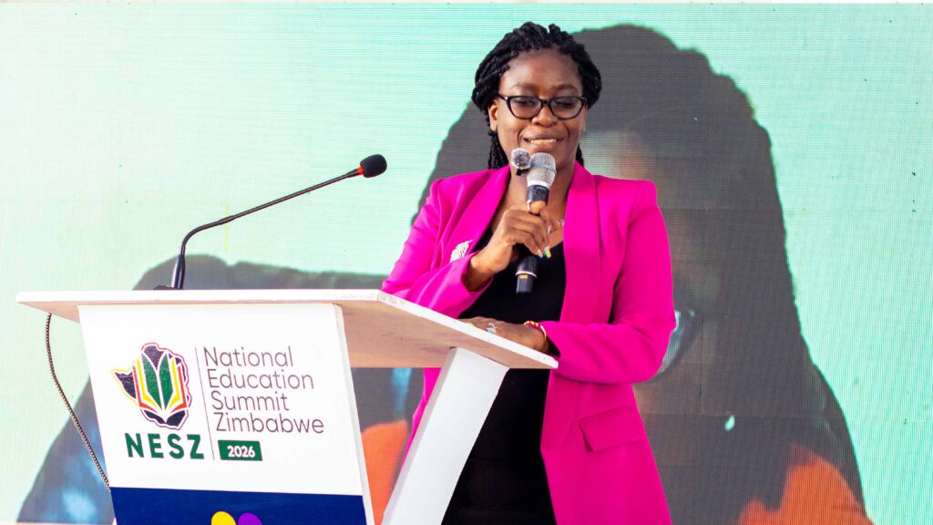Violet Nkathazo - CEO of the National Education Summit Zimbabwe welcoming delegates at the summit